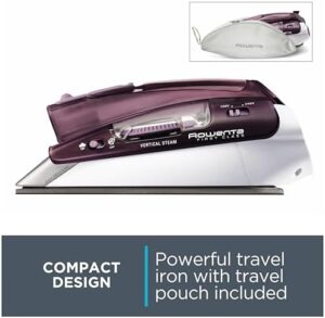 The Rowenta DA1560 iron sits neatly on a small travel suitcase, showing its compact design and dual voltage function. The stainless steel soleplate glistens as it’s poised to glide over fabric, making it the ideal travel companion for quick ironing sessions.