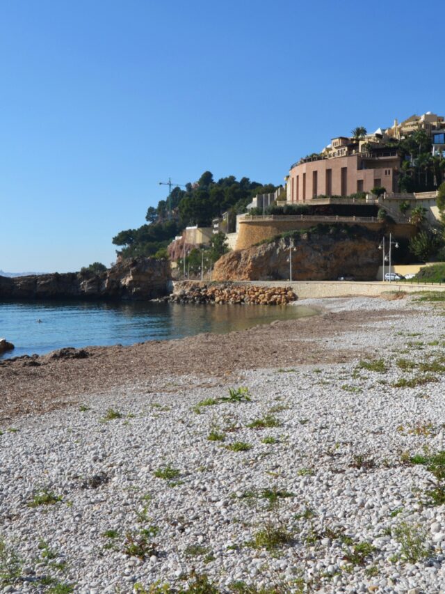 photo of mascarat beach with dunes and nature in the background